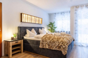 living TIMELESS- Black Forest Style mit Garten, Sauna und Pool für 2-4 Personen